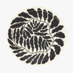 Round serving tray with charcoal leaf motif by Linnéa Andersson for Wrap