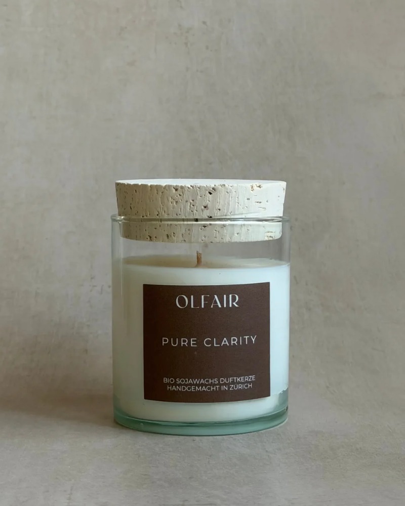 Pure Clarity scented candle by Olfair in a clear glass with cork lid, handmade in Zürich