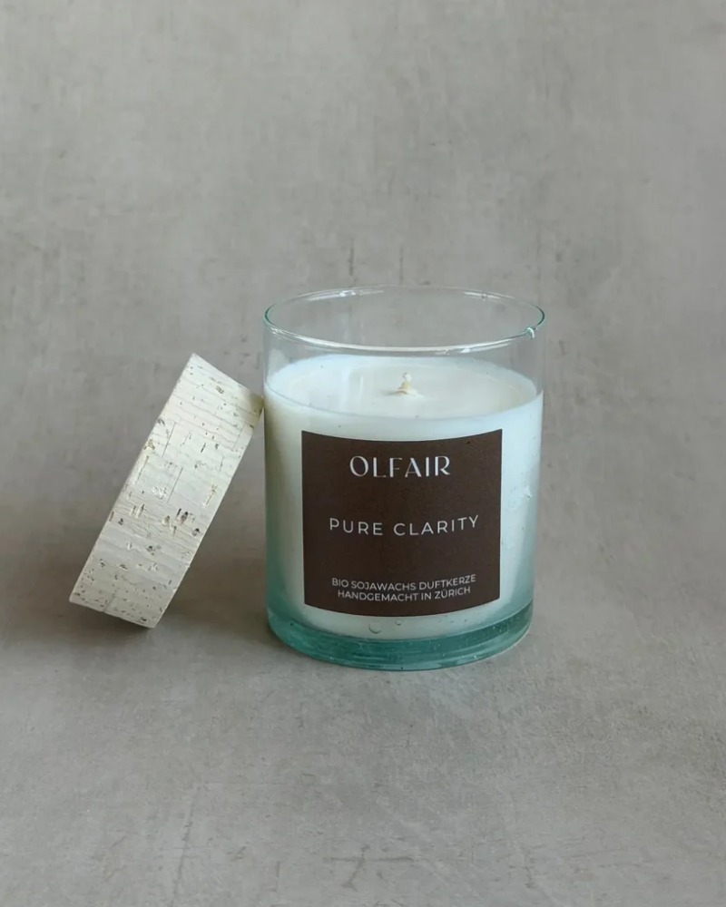 Pure Clarity scented candle by Olfair in a clear glass with cork lid, handmade in Zürich