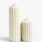 Nordic cylinder candle by Olfair with bold ribbed texture, handmade in Zürich from natural olive wax