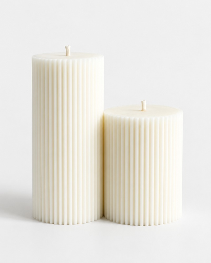 Harmony cylinder candle by Olfair with fine ribbed texture, handmade in Zürich from natural olive wax