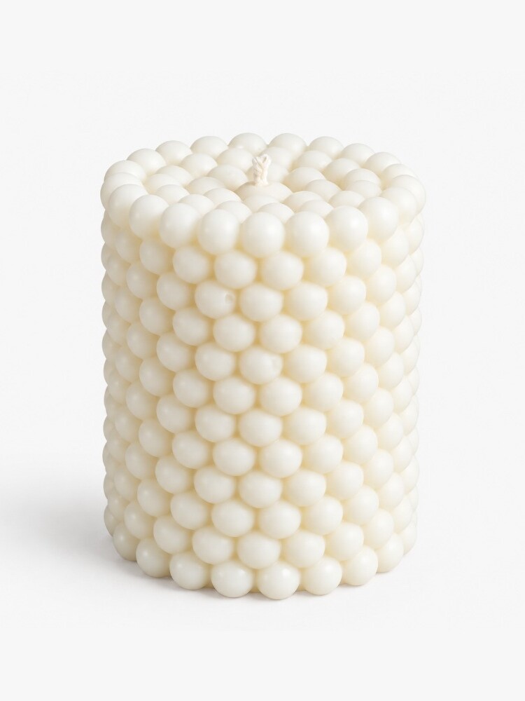 Bubbles cylinder candle by Olfair with raised spherical relief texture, handmade in Zürich from natural olive wax