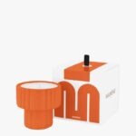 Mamène Podium scented candle size S in coral orange faience, fragrance Jeanne, aromatic and woody