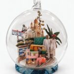 India Christmas ornament by Charlotte Bourrus, 8 cm glass snow ball showing the Taj Mahal