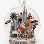Dubai Christmas ornament by Charlotte Bourrus, 8 cm glass snow ball showing the Burj Khalifa above the skyline